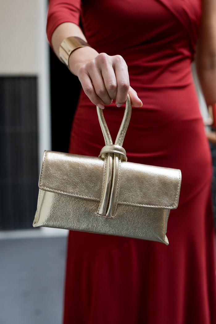 Bolso invitada 100% piel dorado